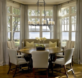 Dining Area - lake view - bay window - monochromatic color scheme - round Table Hickman Design Associates - round dining tables