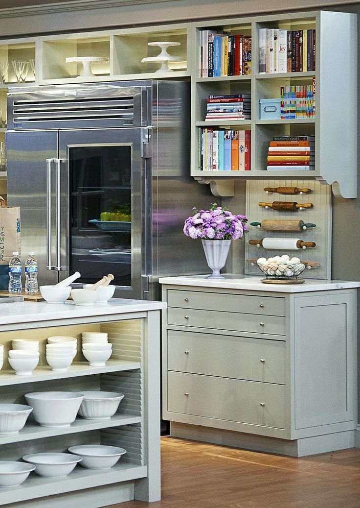 Martha Stewart kitchen. No doors on the upper cabinets for a lighter look.