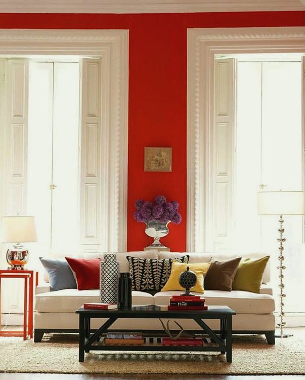 Moder-White-Living-Room-with-Red-Wall-White-Sofa-and-Black-Coffee-Table