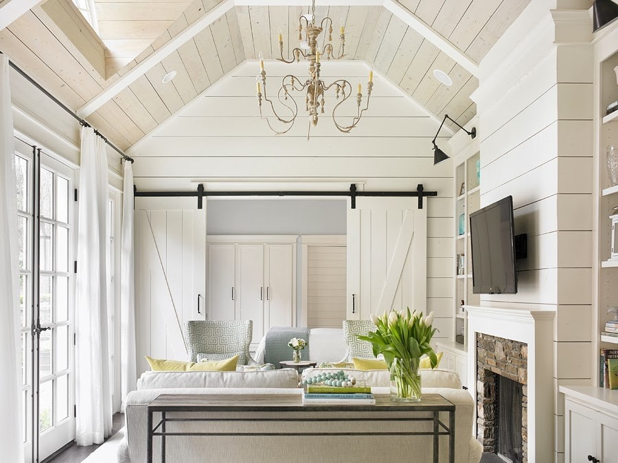tillman-long-interiors-barn-door-white-on-white-living-room-white-linen-drapes-bad-interior-design-trends