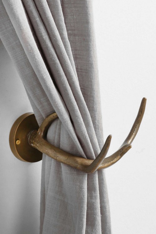 urban-outfitters-faux-antler-curtain-hold-back-
