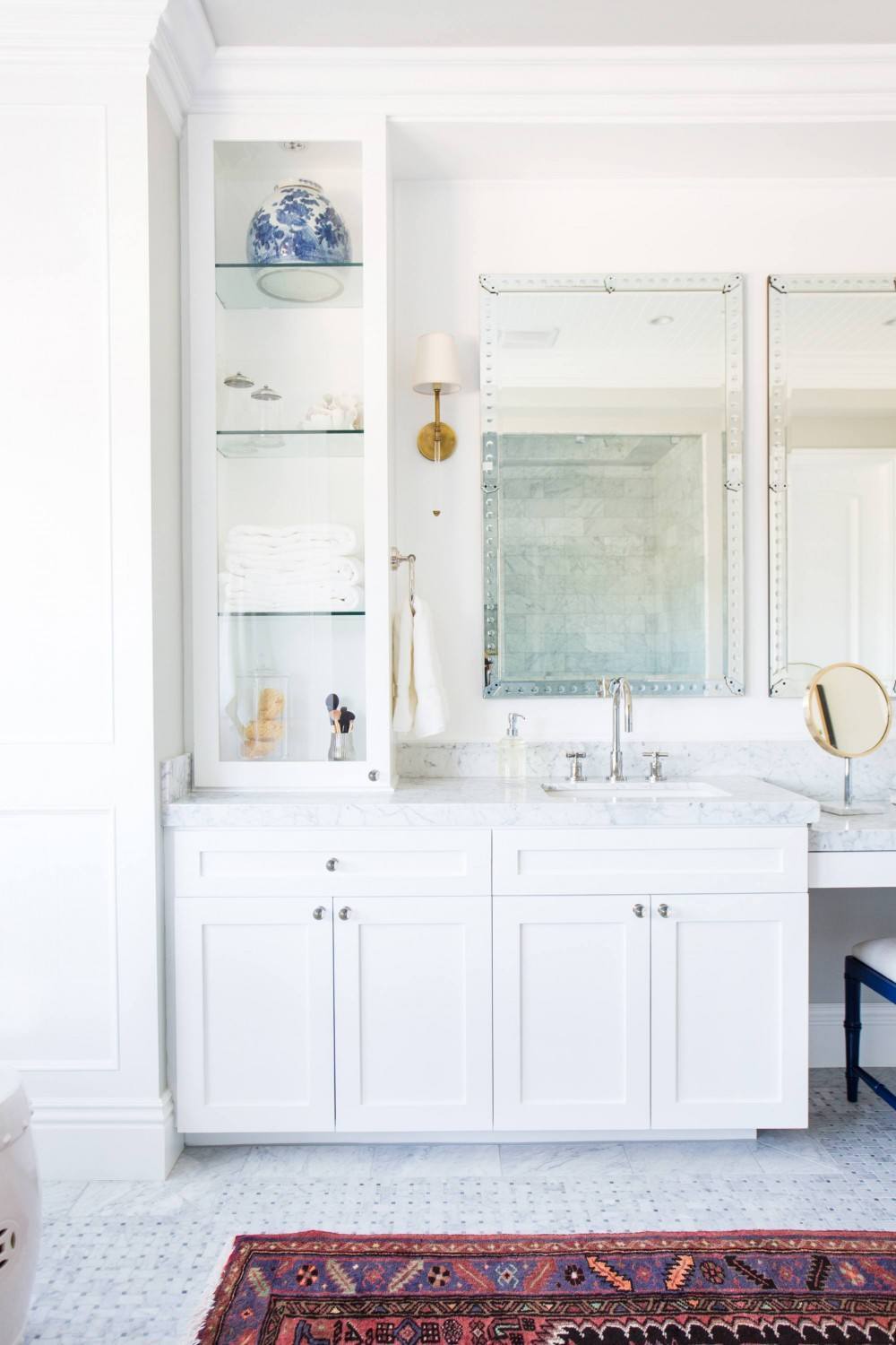 White+Bathroom+Cabinetry,+brass+sconces,+marble+floors+||+Studio+McGee