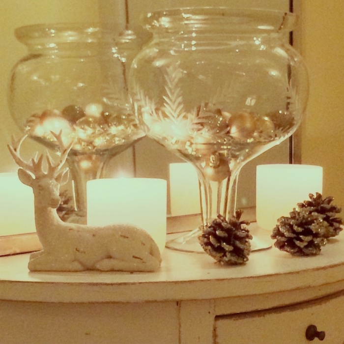 Decorate for Christmas - small table vignette with candles. Very simple and gives off a warm beautiful glow