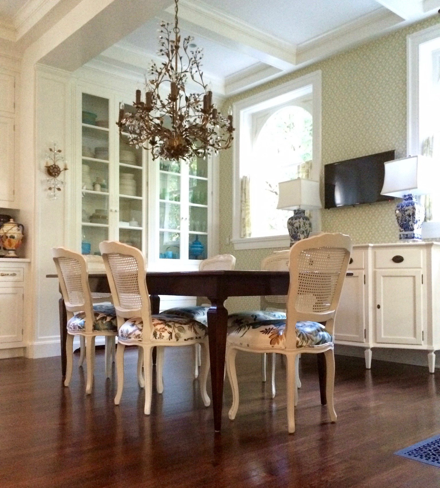 dream kitchen eating area floor to ceiling cabninet crystal chandelier