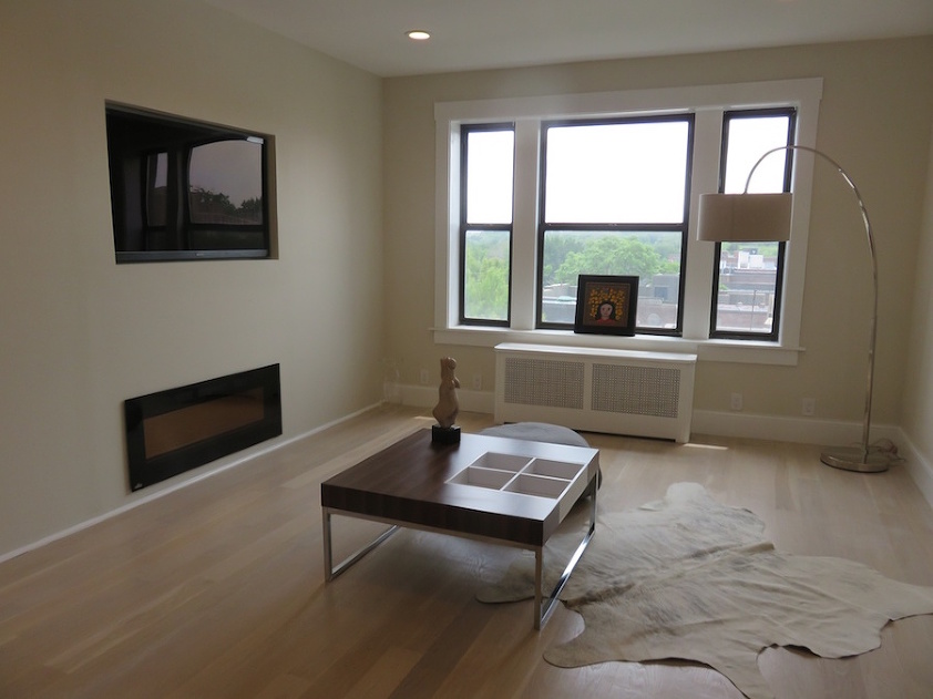 open concept living room built-in TV - bad apartment remodel