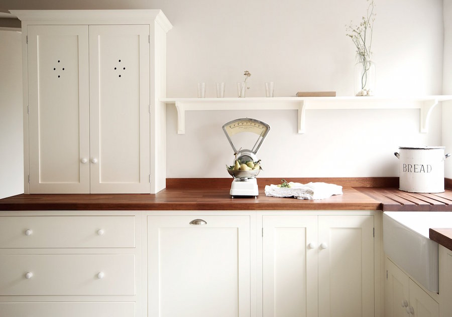 Devol kitchens white kitchen no backsplash - wood counters with a 3" lip of wood and white walls