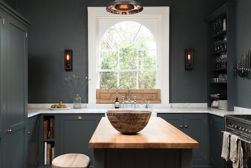 deVOL-WilmingtonSquare- I ADORE this smexy kitchen which is both modern and old at the same time. Kitchen Backsplash is only over the range. Only a small 3" lip of the same material that