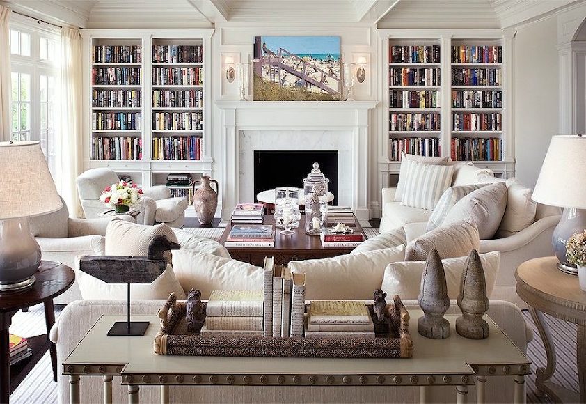 one_kings_lane_alexahampton_pale-white-on-white-warm-paint-colors-living-room-with-classic-fireplace-mantel-and-built-in-bookcases