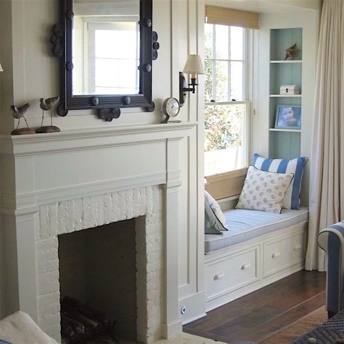 Giannetti Home - beautiful painted brick fireplace and wood mantel to match the walls