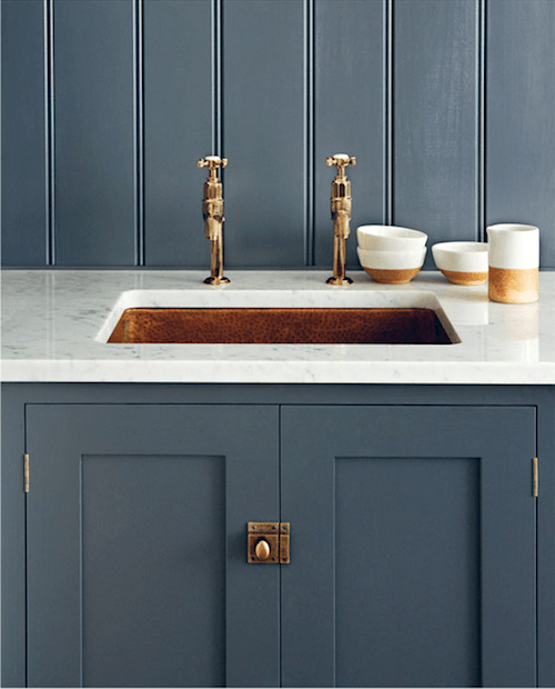 DeVOL copper sink - dark gray blue cabinets - -no stainless steel - antique brass dual faucet - marble counters