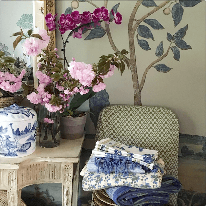 Maura Endres dining room with orchid house plant and cut flowers