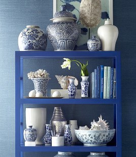 beautifully styled bookcase with blue and white chinoiserie porcelains from wisteria