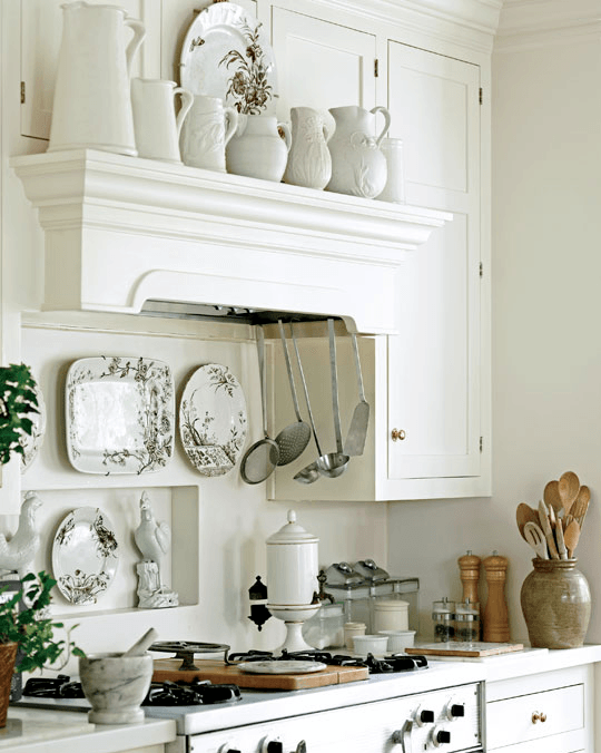 Dan Carithers via Cote De Texas - charming beautifully styled white kitchen with transferware