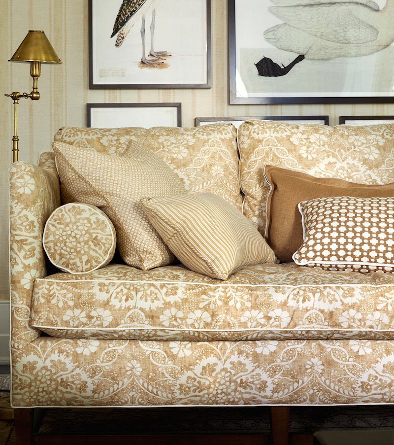 MarkSikes not boring beige living room sofa with fabric from Claremont Fabric Furnishings Company