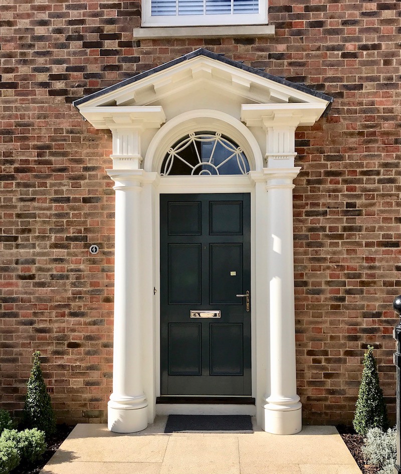 classical door in Poundbury - designed by the new guard of classical architects in the UK