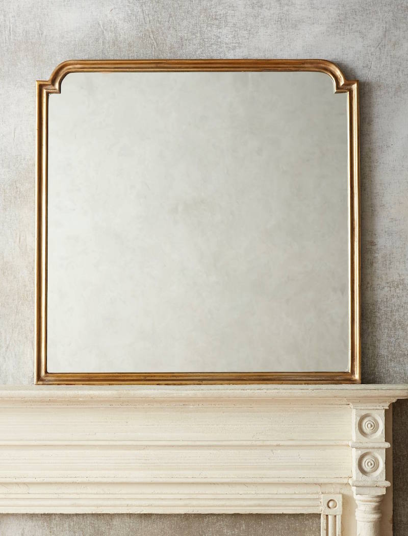 aperture mirror from Anthropologie perfect - eclectic dining room