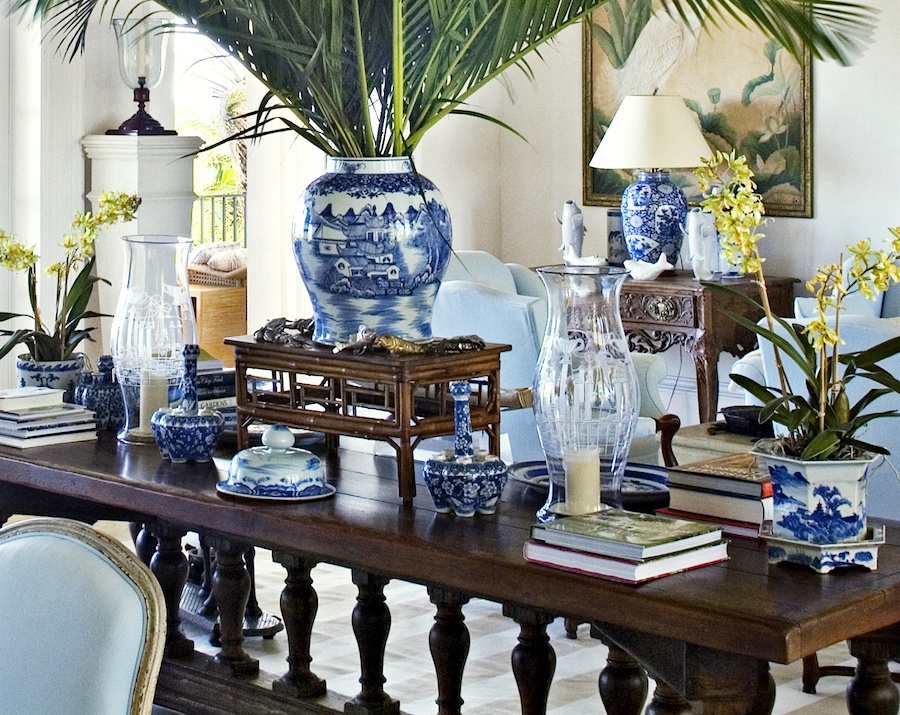 Bunny Williams Punta Can Home on a budget - beautiful library table filled with Chinoiserie porcelains