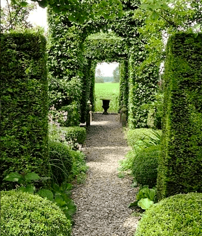 An enfilade of garden doorways at Tuinzondernaam the gardens of Frank Thuyls and his late partner Pierre van Kol.
