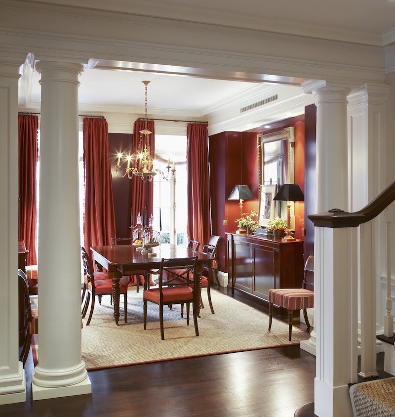 Gil Schafer architect - Miles Redd designer hall looking into red dining room - warm color schemes