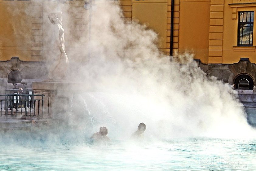 Men receiving steam therapy in a Hungarian thermal bath