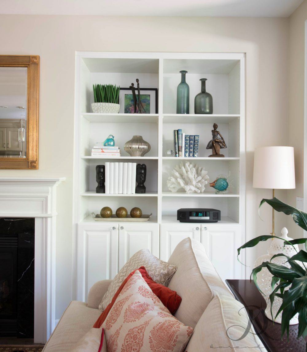 Karen Dunn Interiors - bookcase styling in a pretty living room