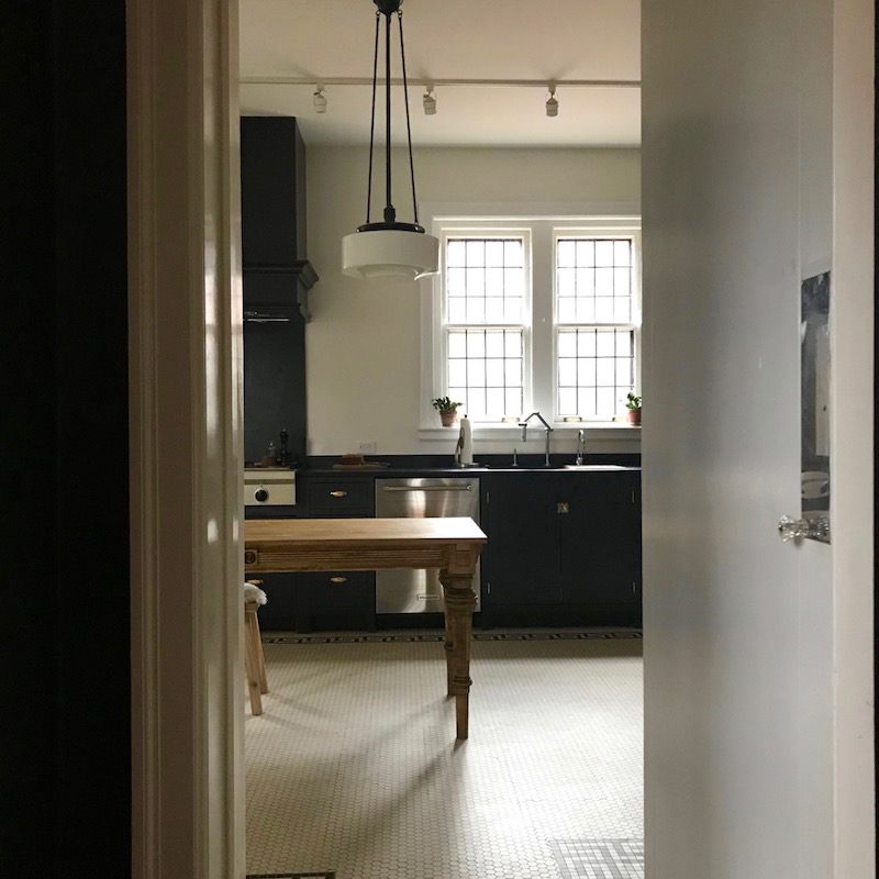 White kitchen in a post gothic interior