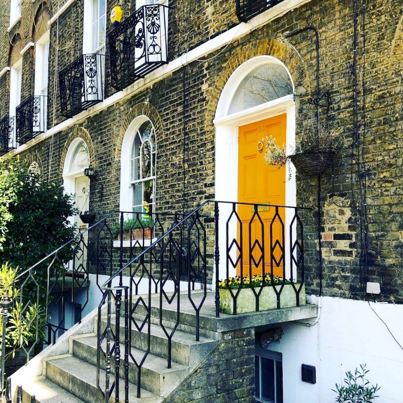 thebirch_boys London - orange door amid old dirty bricks - best front door paint colors.jpg