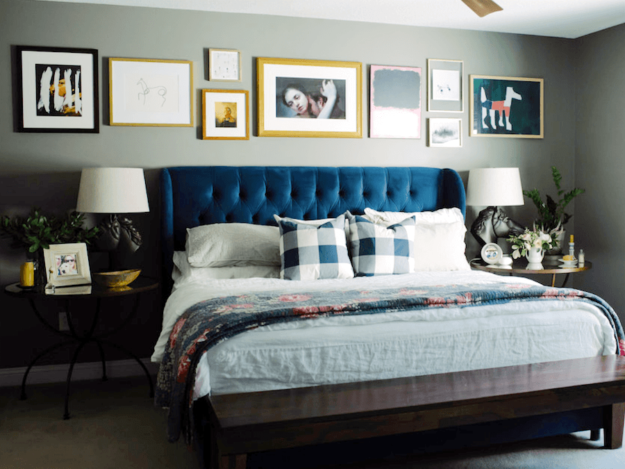 beautiful bedroom photo by Melissa Cholendt - sage green walls with pretty art over the bed