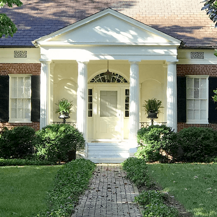 via Barbara Westbrook Interiors on instagram - Greek key home exterior Atlanta
