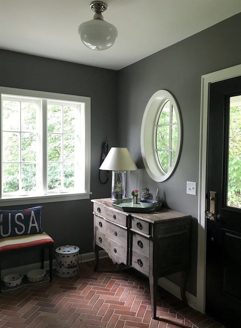 handsome mudroom in young family home painted Benjamin Mooreo Chelsea Gray