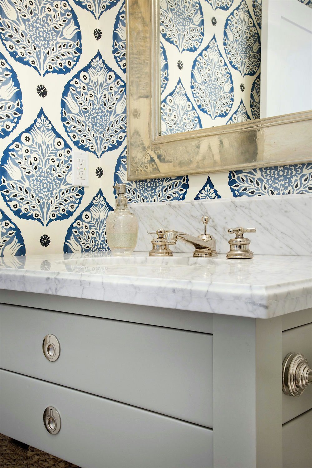 Erin Hedrick design - beautiful bathroom - chic medicine cabinet mirror-Galbraith and Paul wallpaper marble sink - nickel faucet