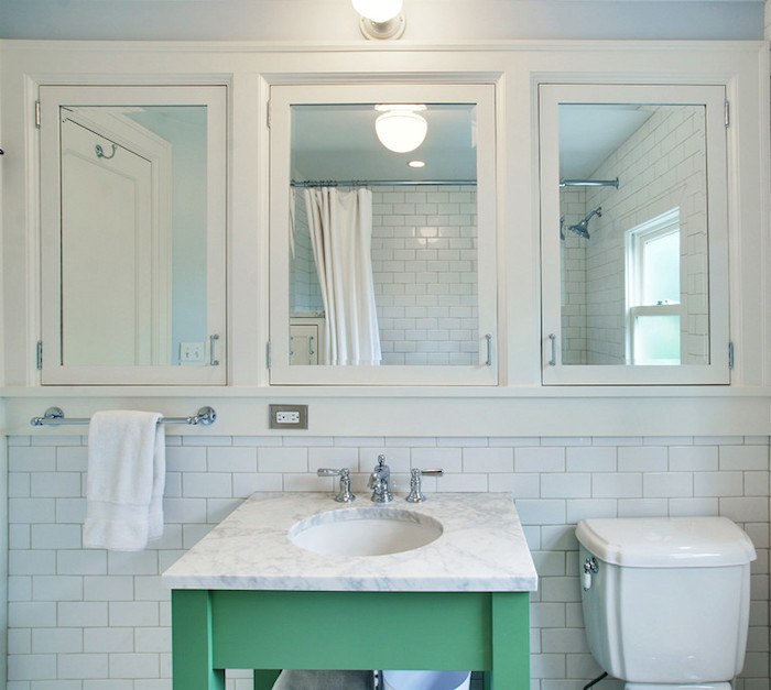 JAS Design Build- mirrored-medicine-cabinet-Bathroom-green-vanity-inset-medicine cabinets-lever-faucet-Marble counter