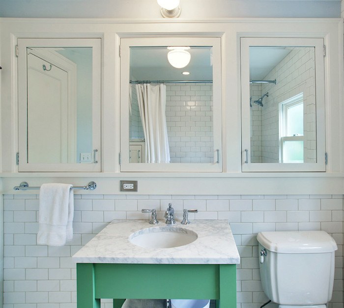 https://laurelberninteriors.com/wp-content/uploads/2018/07/10-37175-post/JAS-Design-Build-mirrored-medicine-cabinet-Bathroom-green-vanity-inset-medicine-cabinets-lever-faucet-Marble.jpg