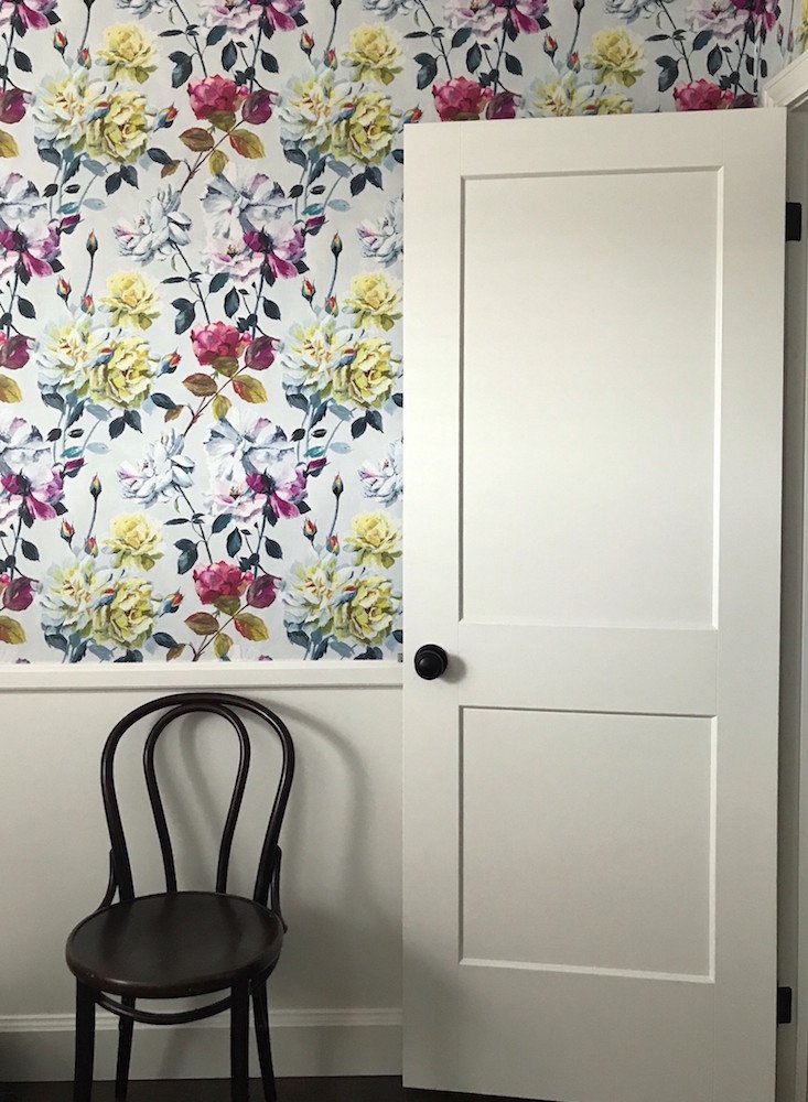 Vanessa Francis black door knobs with floral wallpaper guest-room