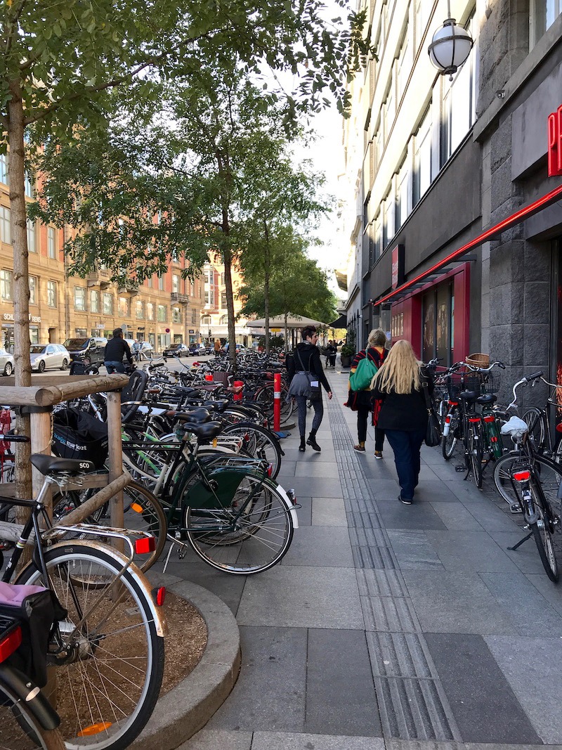 Donna, Jennifer, Susie - strolling amongst bicycles - Copenhagen Denmark