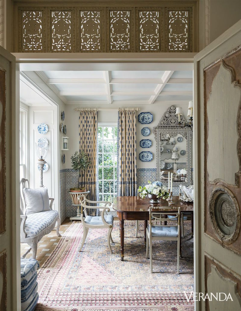 Veranda designer Cathy Kincaid-decorating with plates -Spanish-style home - photo-James Merrell