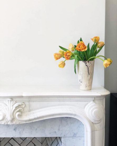 top decorating trends - stone fireplace mantel - Erin Hiemstra | Apartment 34 (@apartment_34) beautiful orange flowers