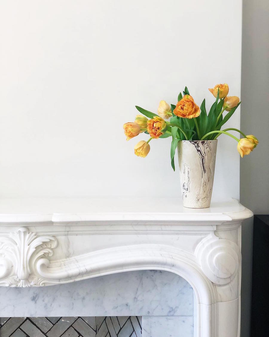 top decorating trends - stone fireplace mantel - Erin Hiemstra | Apartment 34 (@apartment_34) beautiful orange flowers
