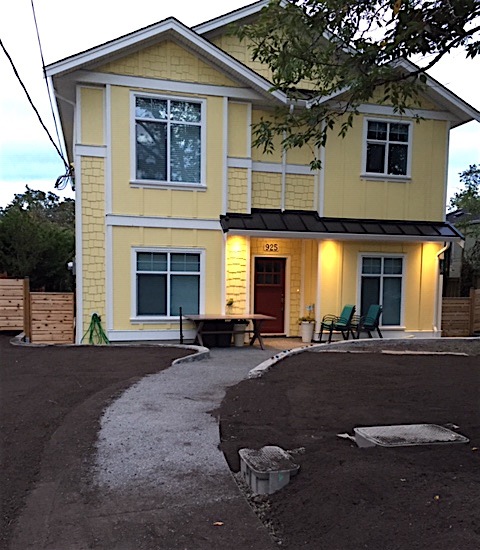 hideous windows bright yellow house