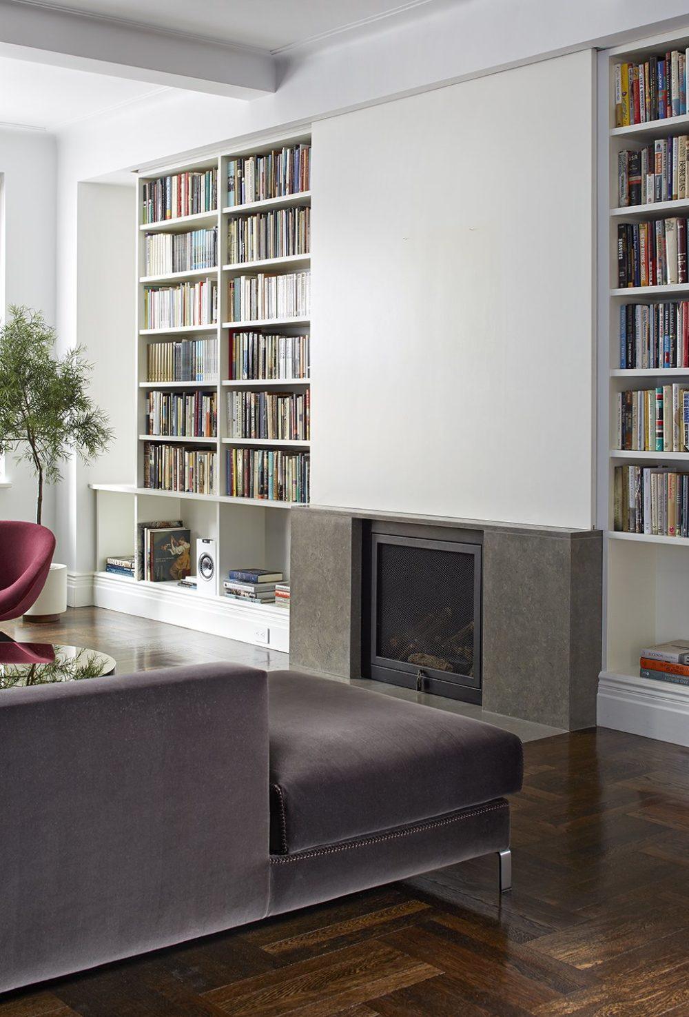 via Dwell.com - James Wagman - Architect - Panel over fireplace - conceals TV