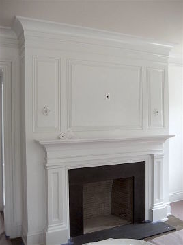 Fireplace wall built out. Original source unknown - faux fireplace