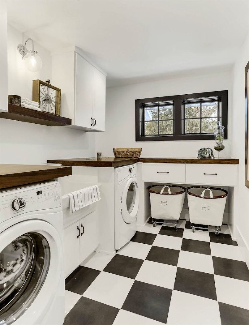 West Bay Homes-black and white laundry room