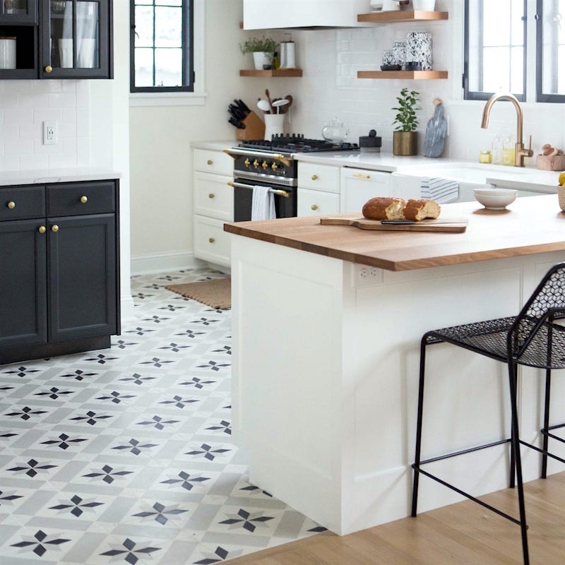 Wit and Delight - via Domino Mag - Encaustic Cement kitchen floor