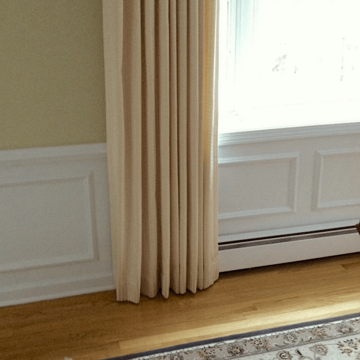 curtains over baseboard heaters