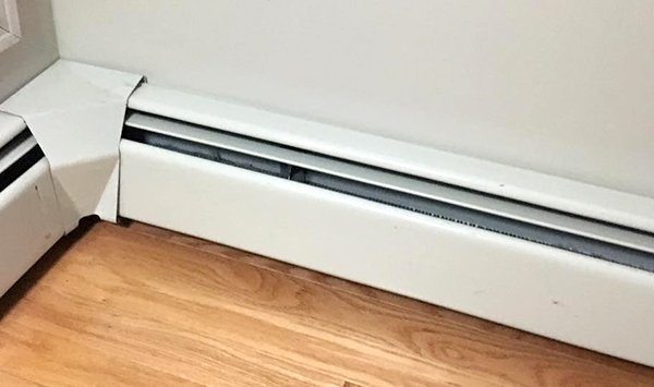 ugly metal baseboard heater