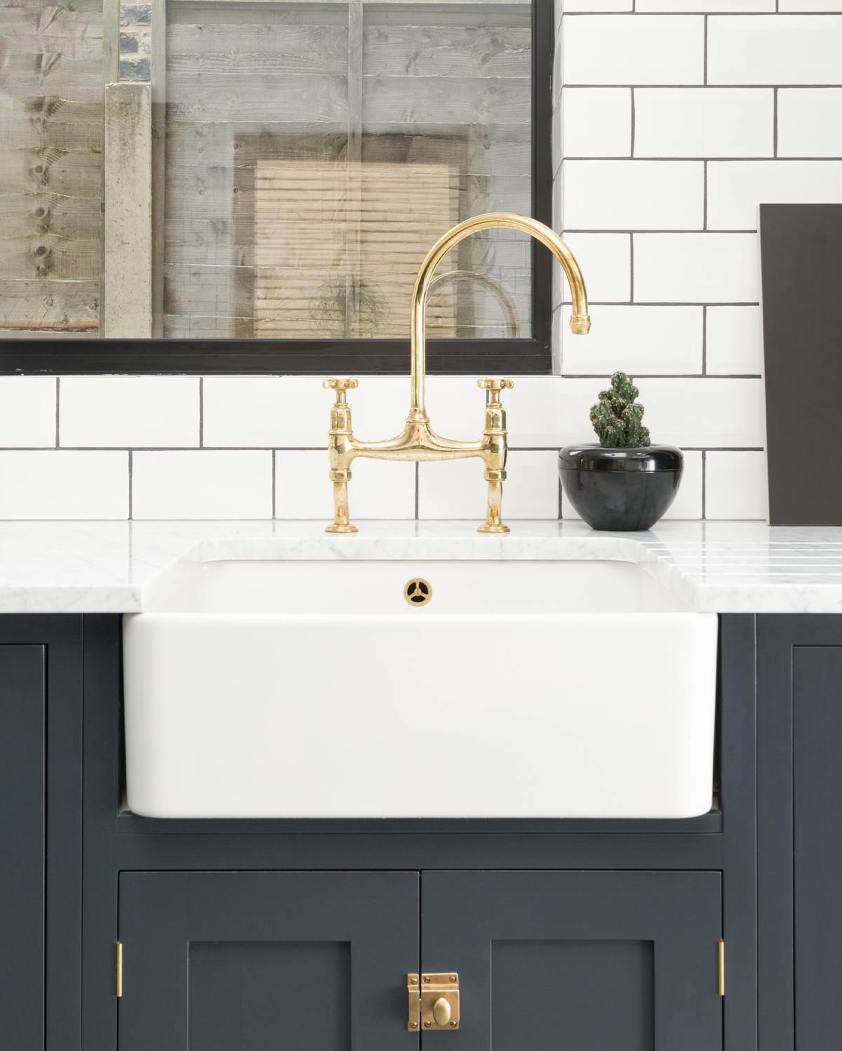 Classic Sinks - DeVOL - Bridge faucet - white sink - subway tile - dark, gray blue cabinetry - classic kitchen combos