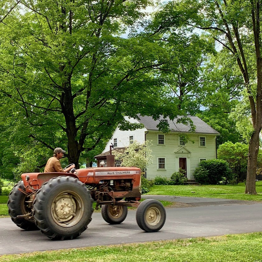 photo: LB Interiors - Dude on Tractor eating apple