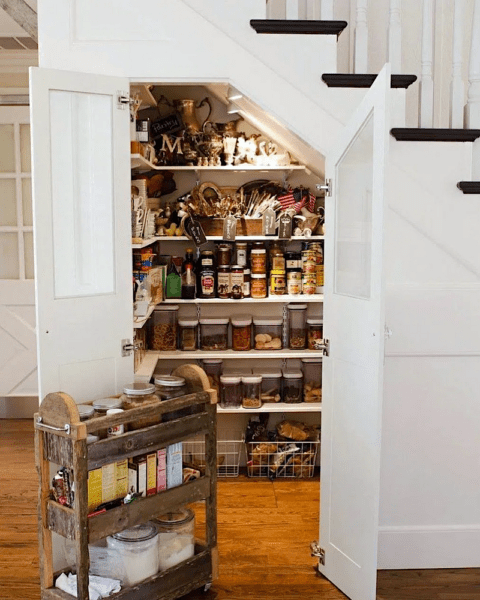 via @mikrobertshomes - hidden storage under stairs - kitchen pantry