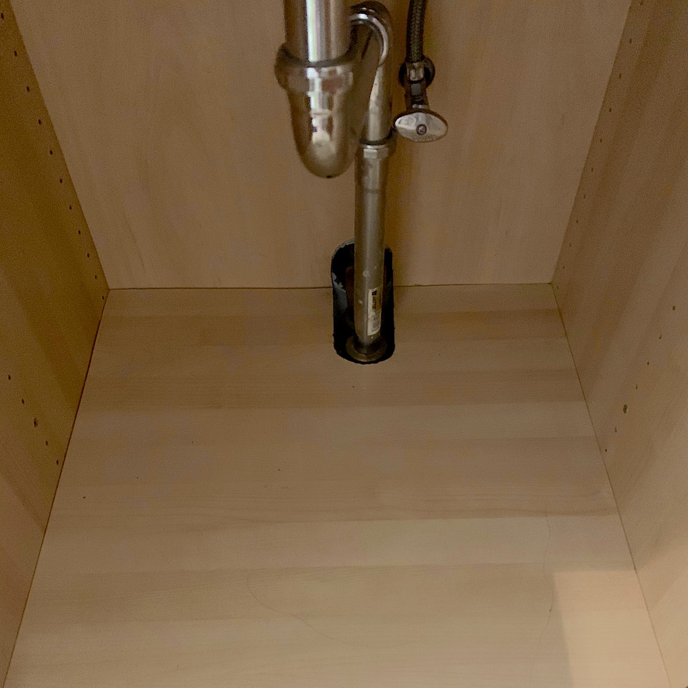 crappy plumbing bathroom cabinet