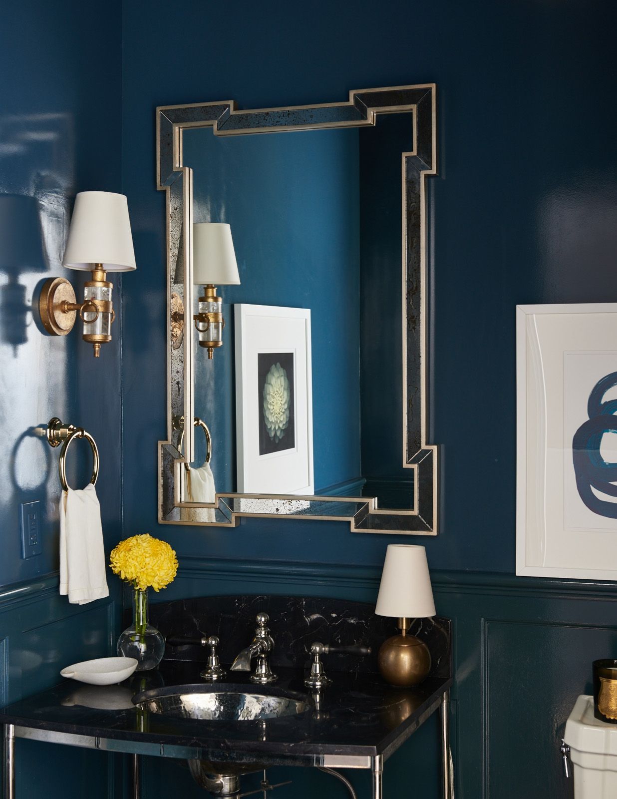 Mark D Sikes dark blue bathroom with cool Visual Comfort Sconces and Made Goods Norma mirror - best home lighting